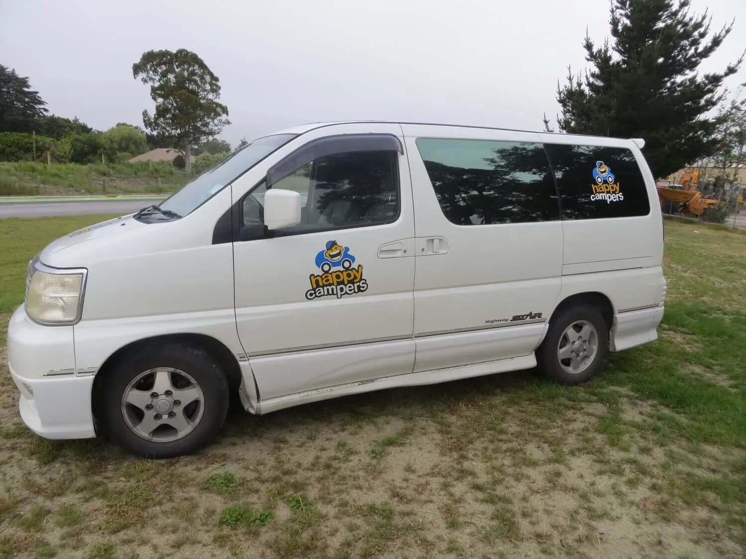 Neuseeland, Happy Camper, Original Sleeper, Camper im Vordergrund